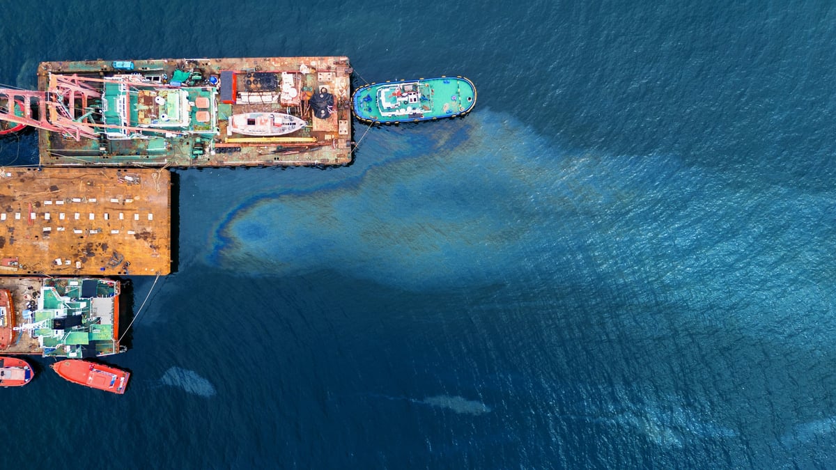 Oil spill pollution on water surface